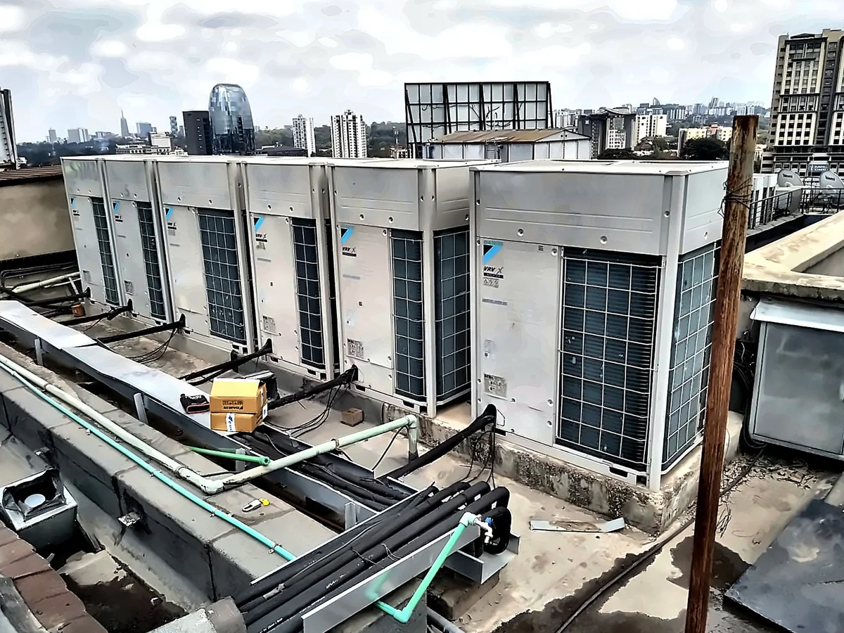 Rooftop Daikin VRV X multi-tenant installation overlooking the Nairobi skyline